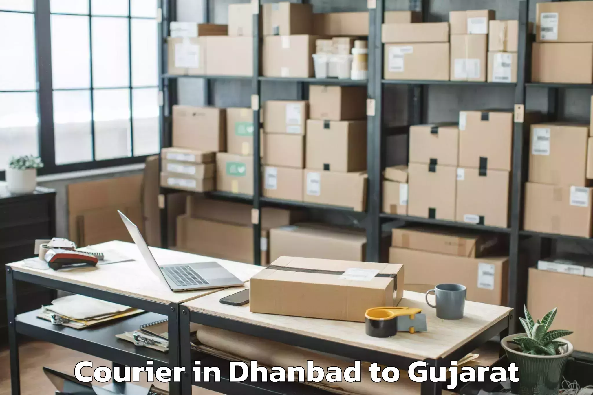 Easy Dhanbad to Una Gir Somnath Courier Booking